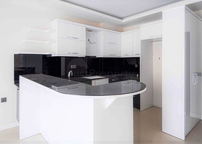 شقة للبيع في اوبا بسعر مناسب - غرفة وصالة ضمن مجمع حديث - قريبة من البحر -اوبا / الانيا 