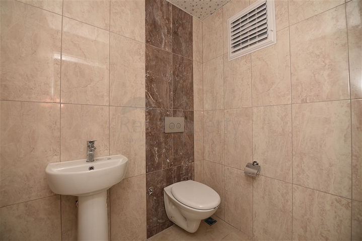 مطبخ منفصل - شقة 2 غرفة وصالة -جديدة- في مركز الانيا 