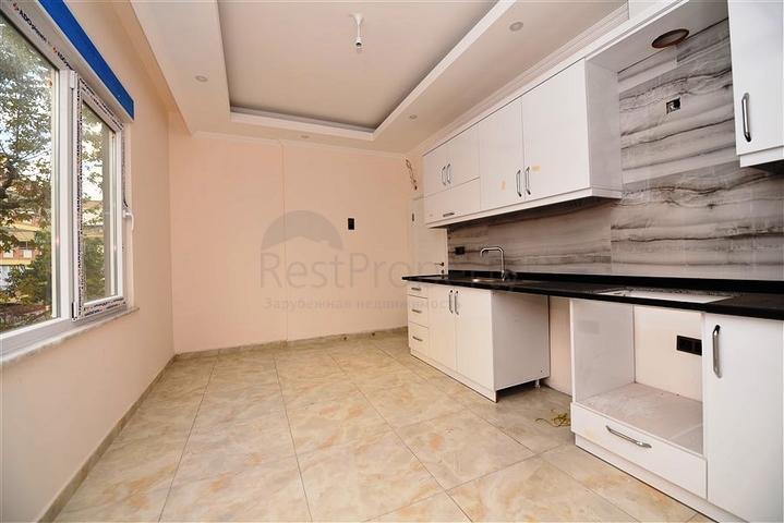 مطبخ منفصل - شقة 2 غرفة وصالة -جديدة- في مركز الانيا 