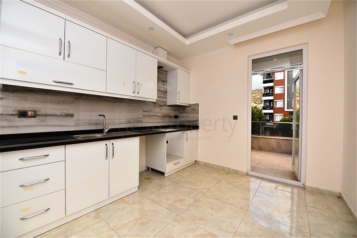 مطبخ منفصل - شقة 2 غرفة وصالة -جديدة- في مركز الانيا 