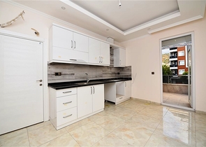 مطبخ منفصل - شقة 2 غرفة وصالة -جديدة- في مركز الانيا 