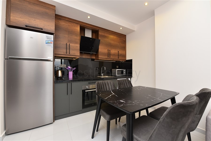 شقة جميلة بغرفة نوم واحدة للإيجار في مجمع من نوع الفندق