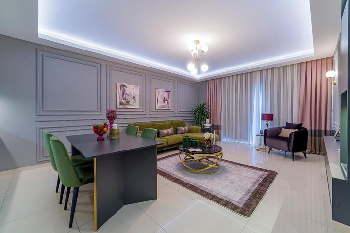 شقة واسعة - غرفة نوم وصالة -اثاث انيق -في محمودلار / الانيا 