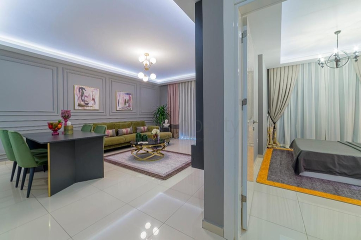 شقة واسعة - غرفة نوم وصالة -اثاث انيق -في محمودلار / الانيا 