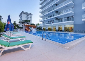 شقة واسعة - غرفة نوم وصالة -اثاث انيق -في محمودلار / الانيا 