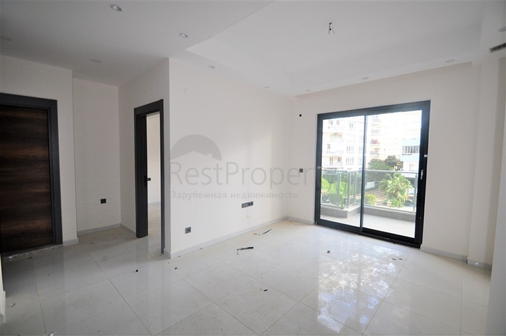 مناسبة للعطلات والاستثمار -شقة 1+1 ضمن مجمع حديث في محمودلار/ الانيا 