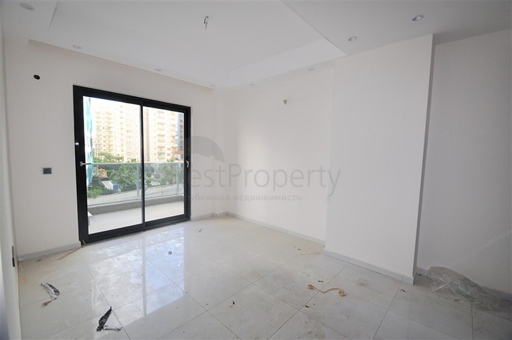 مناسبة للعطلات والاستثمار -شقة 1+1 ضمن مجمع حديث في محمودلار/ الانيا 