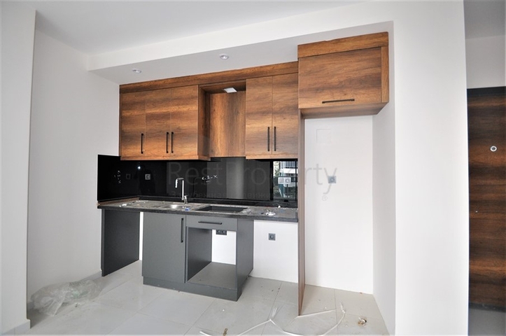 مناسبة للعطلات والاستثمار -شقة 1+1 ضمن مجمع حديث في محمودلار/ الانيا 