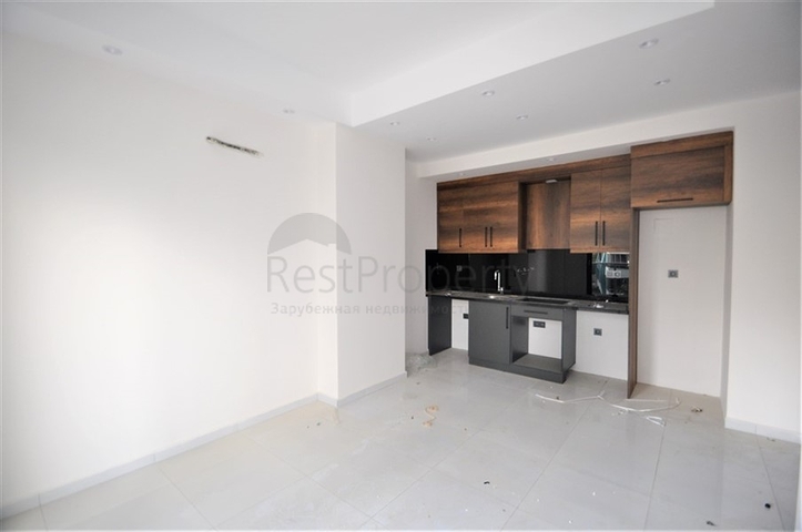 مناسبة للعطلات والاستثمار -شقة 1+1 ضمن مجمع حديث في محمودلار/ الانيا 