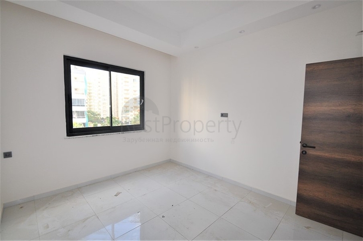 مناسبة للعطلات والاستثمار -شقة 1+1 ضمن مجمع حديث في محمودلار/ الانيا 