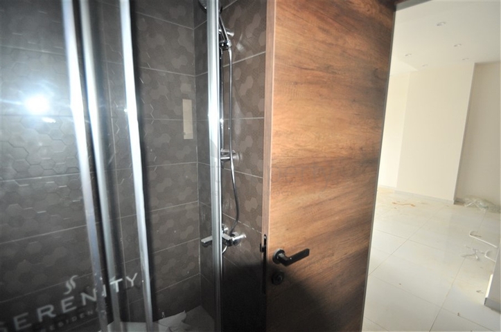 مناسبة للعطلات والاستثمار -شقة 1+1 ضمن مجمع حديث في محمودلار/ الانيا 