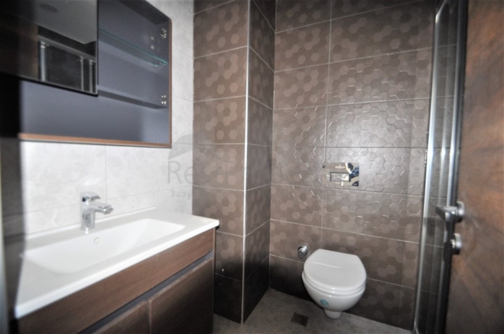 مناسبة للعطلات والاستثمار -شقة 1+1 ضمن مجمع حديث في محمودلار/ الانيا 