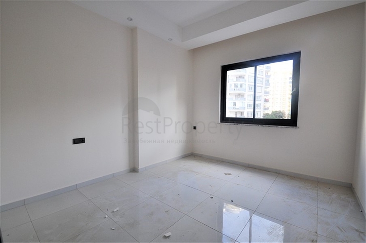 مناسبة للعطلات والاستثمار -شقة 1+1 ضمن مجمع حديث في محمودلار/ الانيا 