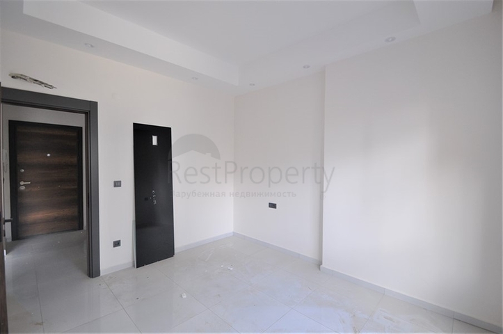 مناسبة للعطلات والاستثمار -شقة 1+1 ضمن مجمع حديث في محمودلار/ الانيا 