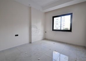 مناسبة للعطلات والاستثمار -شقة 1+1 ضمن مجمع حديث في محمودلار/ الانيا 