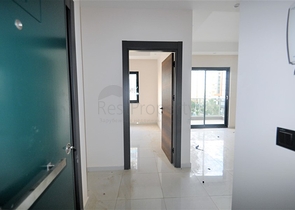 مناسبة للعطلات والاستثمار -شقة 1+1 ضمن مجمع حديث في محمودلار/ الانيا 