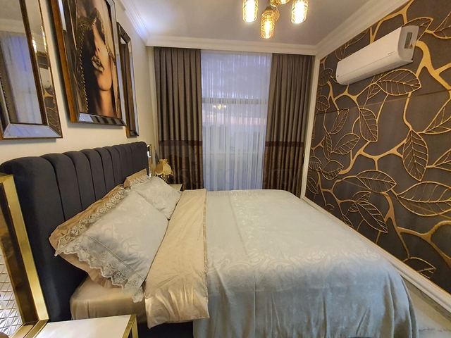 شقة غرفة وصالة جديدة - مفروشة وضمن مجمع سكني في محمودلار / الانيا 