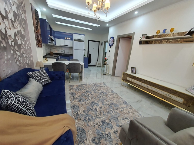 شقة غرفة وصالة جديدة - مفروشة وضمن مجمع سكني في محمودلار / الانيا 