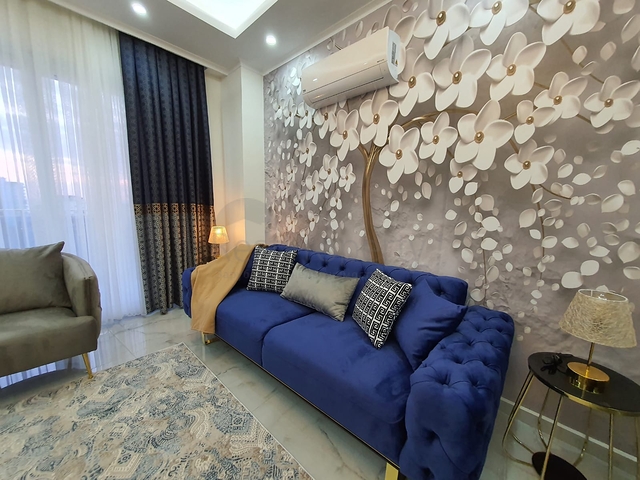 شقة غرفة وصالة جديدة - مفروشة وضمن مجمع سكني في محمودلار / الانيا 