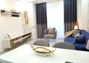 شقة غرفة وصالة جديدة - مفروشة وضمن مجمع سكني في محمودلار / الانيا 