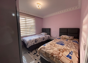 شقة عائلية واسعة في الانيا - غرفتين وصالة مفروشة -ضمن مجمع سكني -محمودلار/ الانيا 