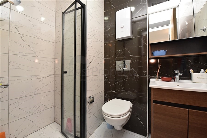 شقق للبيع في اوبا - غرفة وصالة ضمن مجمع حديث -اوبا / الانيا 