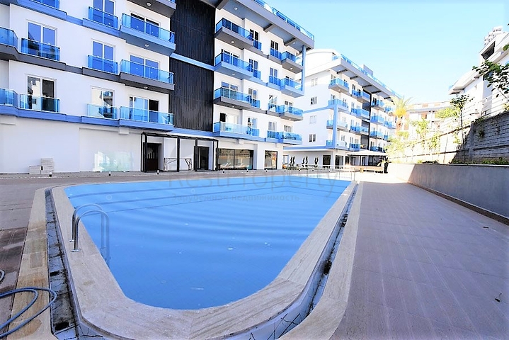 شقق للبيع في اوبا - غرفة وصالة ضمن مجمع حديث -اوبا / الانيا 