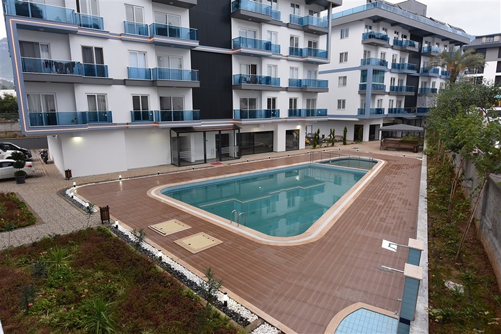 شقة غرفة وصالة ضمن مجمع حديث -اوبا / الانيا 