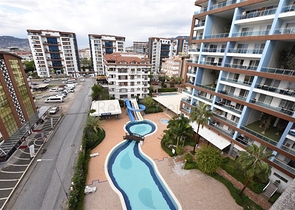 شقة ضمن مجمع فاخر في الانيا - خلف مول الانيوم -غرفة وصالة - جيكجلي / الانيا 