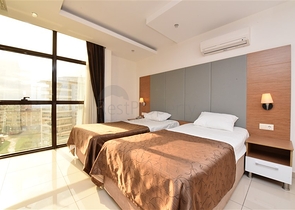 شقة ضمن مجمع فاخر في الانيا - خلف مول الانيوم -غرفة وصالة - جيكجلي / الانيا 