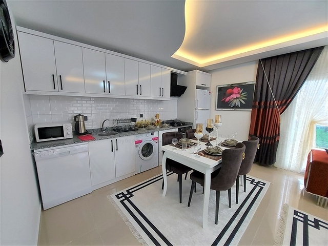 شقة غرفتين وصالة مفروشة -ضمن مجمع سكني قريب من البحر والاسواق -في محمودلار / الانيا 