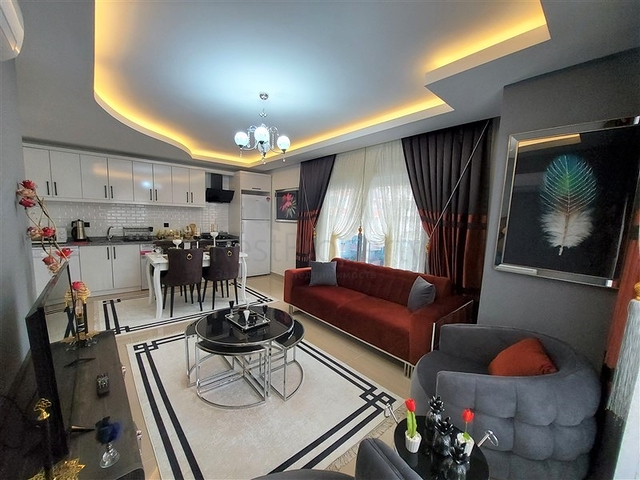 شقة غرفتين وصالة مفروشة -ضمن مجمع سكني قريب من البحر والاسواق -في محمودلار / الانيا 