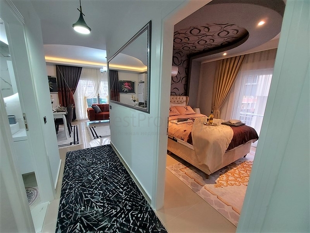 شقة غرفتين وصالة مفروشة -ضمن مجمع سكني قريب من البحر والاسواق -في محمودلار / الانيا 