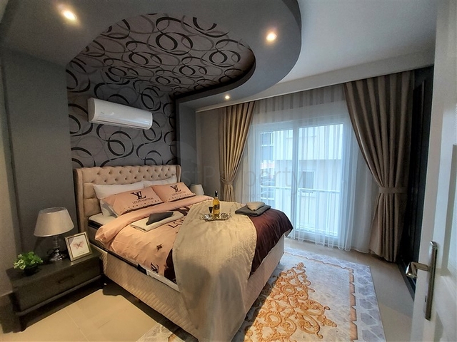 شقة غرفتين وصالة مفروشة -ضمن مجمع سكني قريب من البحر والاسواق -في محمودلار / الانيا 