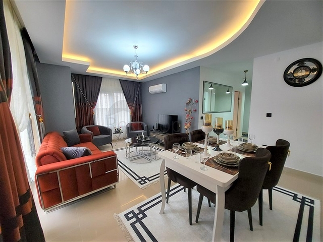 شقة غرفتين وصالة مفروشة -ضمن مجمع سكني قريب من البحر والاسواق -في محمودلار / الانيا 