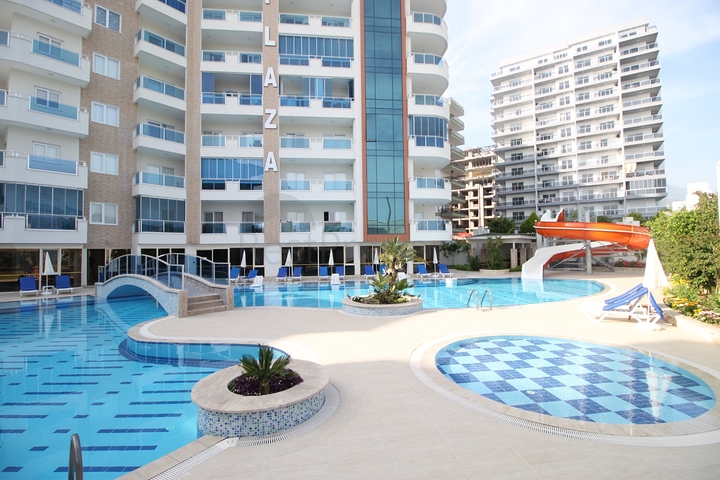 شقة انيقة -غرفتين وصالة مفروشة -ضمن مجمع سكني في محمودلار / الانيا 