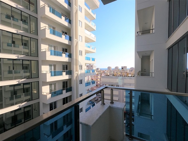 ضمن مجمع 5 نجوم - شقة غرفة وصالة واسعة نسبيا - في محمودلار / الانيا 