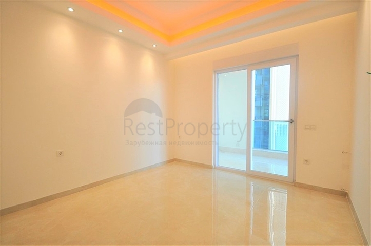 ضمن مجمع 5 نجوم - شقة غرفة وصالة واسعة نسبيا - في محمودلار / الانيا 