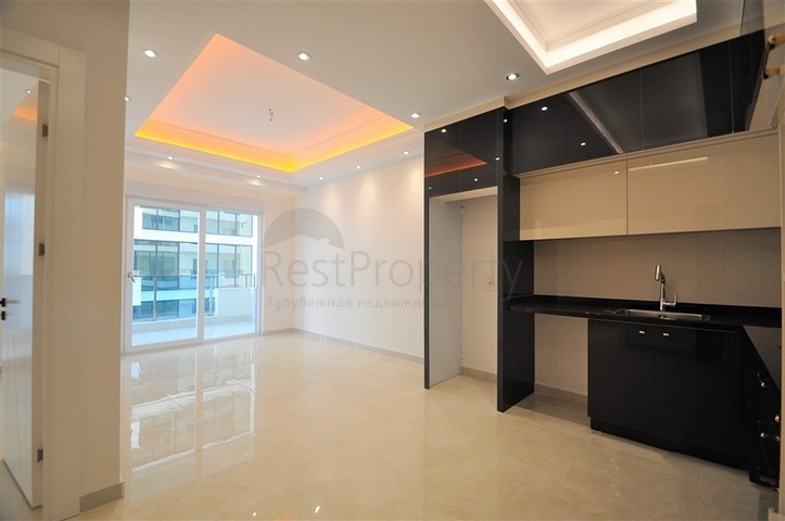 ضمن مجمع 5 نجوم - شقة غرفة وصالة واسعة نسبيا - في محمودلار / الانيا 