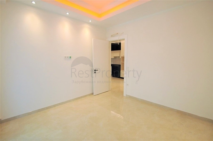 ضمن مجمع 5 نجوم - شقة غرفة وصالة واسعة نسبيا - في محمودلار / الانيا 