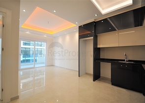 ضمن مجمع 5 نجوم - شقة غرفة وصالة واسعة نسبيا - في محمودلار / الانيا 