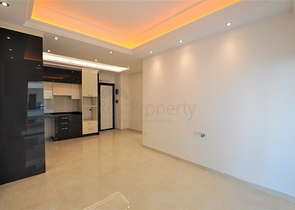 ضمن مجمع 5 نجوم - شقة غرفة وصالة واسعة نسبيا - في محمودلار / الانيا 