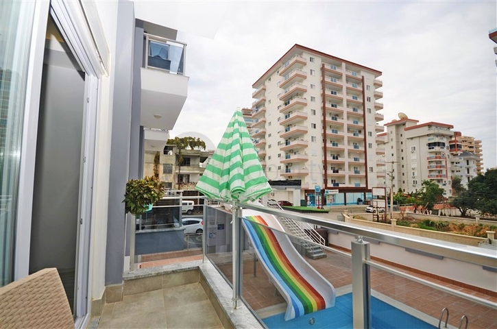 شقة غرفة وصالة مفروشة -مجمع سكني حديث - في محمودلار/ الانيا 