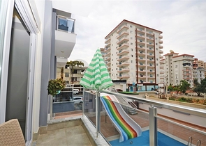 شقة غرفة وصالة مفروشة -مجمع سكني حديث - في محمودلار/ الانيا 