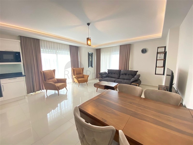 شقة واسعة غرفتين وصالة -ضمن مجمع حديث - في محمودلار/ الانيا 