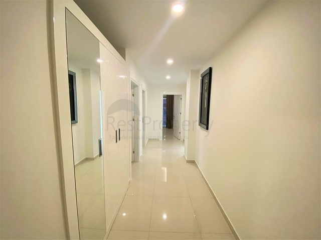 شقة واسعة غرفتين وصالة -ضمن مجمع حديث - في محمودلار/ الانيا 