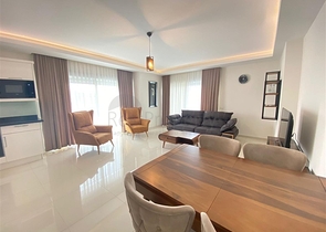 شقة واسعة غرفتين وصالة -ضمن مجمع حديث - في محمودلار/ الانيا 