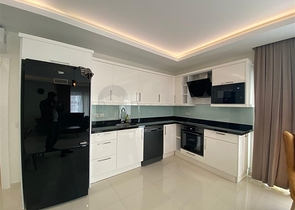 شقة واسعة غرفتين وصالة -ضمن مجمع حديث - في محمودلار/ الانيا 