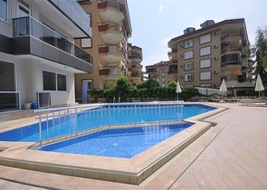 شقق للبيع في اوبا - غرفة وصالة مفروشة -قريبة من البحر / الانيا 