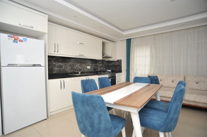 دوبلكس ارضية 3 غرف وصالة -ضمن مجمع سكني حديث -في منطقة كاستل / الانيا 